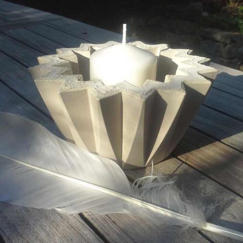 Beton-Windlicht in Sternform mit Feder